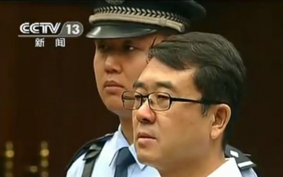 China ex-police chief gets 15 years in jail