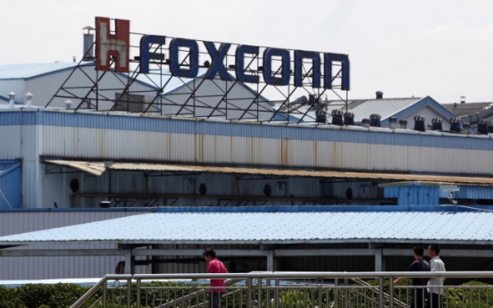 Foxconn workers return to iPhone production after stoppage