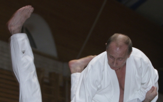 Sports-mad Putin promoted to the eighth dan in judo