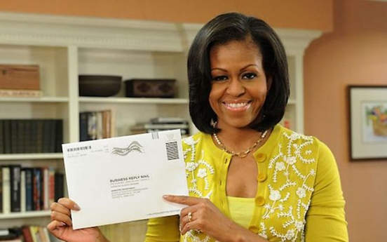 From Michelle with love, first lady casts vote