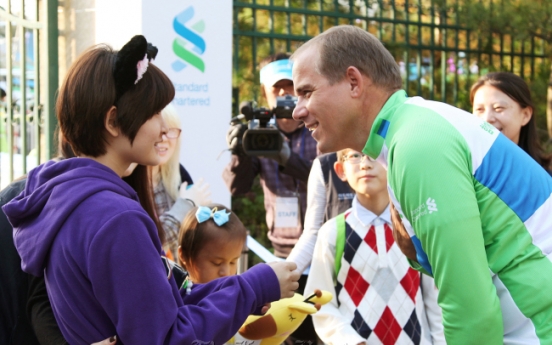 Standard Chartered supports blind children, conservation of Korea’s wetland habitats