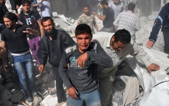 49 die as Syrian jets blast rebel-held town