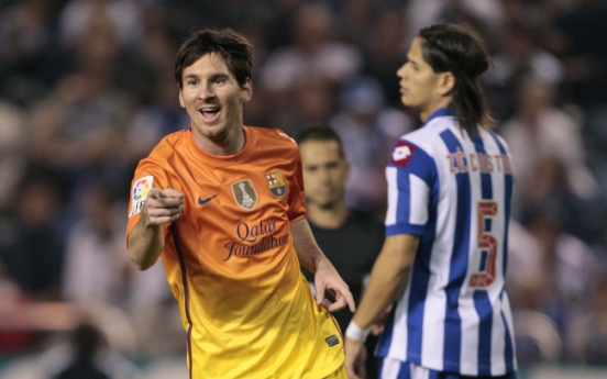 Messi’s hat trick lifts Barcelona