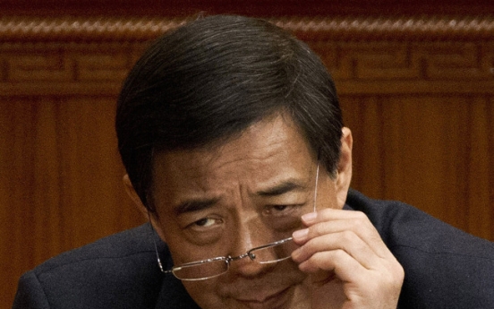 China expels Bo from legislature, set for trial