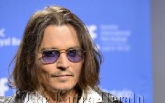 Woman claims damages over Depp guards ‘attack’