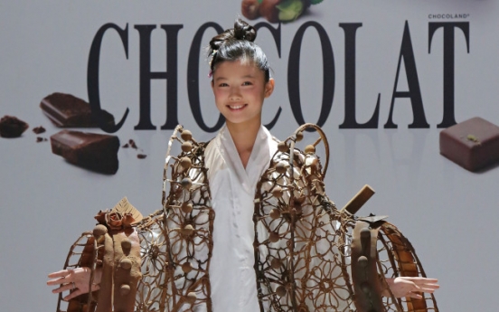 ‘May Queen’ actress hits Paris catwalk in chocolate dress