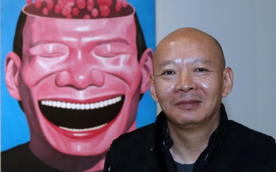 Chinese art star Yue brings ‘laughing men’ to Europe