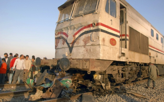 Egyptian train hits school bus, at least 51 killed