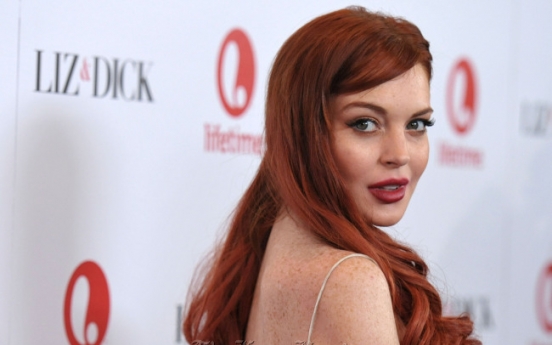 Lohan says red carpet ‘feels great’