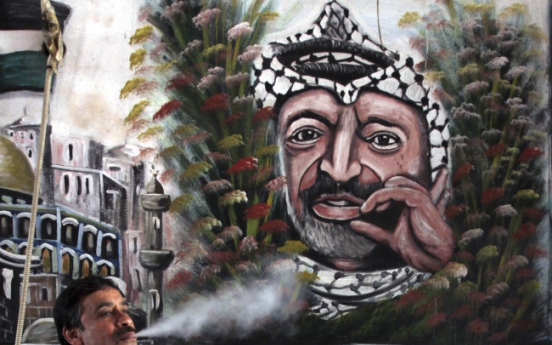 Arafat grave dug up for probe of poison suspicion