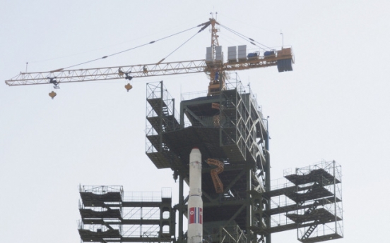 N.K. erecting last stage of rocket