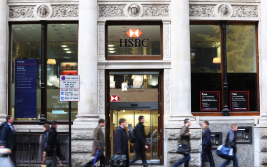 Fitch lowers HSBC rating