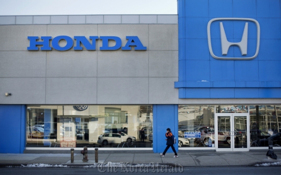 Honda recalls 871,000 cars on roll away defect