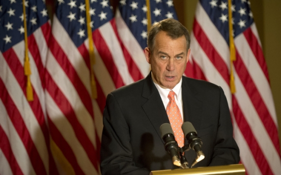 Obama, Boehner clash over fiscal cliff