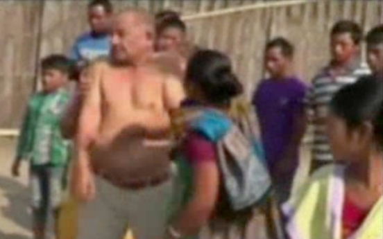 Indian politician stripped and beaten by crowd after rape