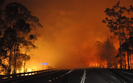 Cooler weather helps Australian firefighters