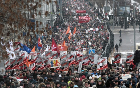 Thousands march in Moscow to protest Russia’s adoption ban