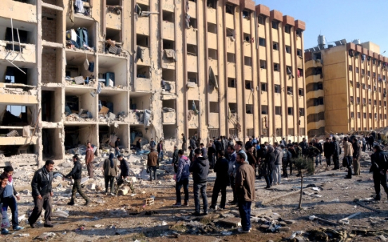 Dozens killed in Syrian university blasts