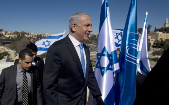 As Israelis vote, peace seems distant