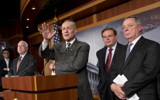 U.S. senators vow immigration action