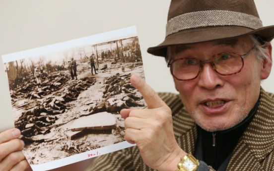 Historian releases photos of Japanese post-quake massacre