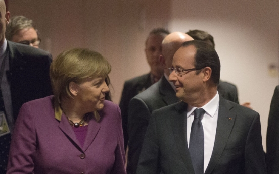 EU leaders OK reduced budget