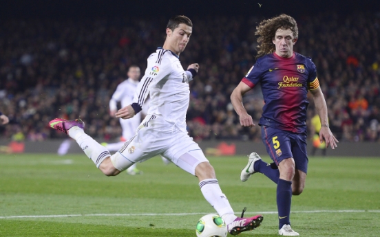 Ronaldo leads Madrid past Barca to make Copa final