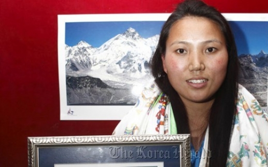 2 Everest climbs put Nepalese woman in record book