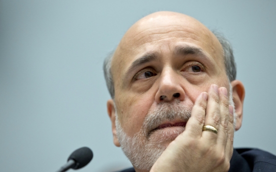 Bernanke defends Fed’s rate policies