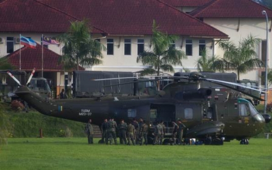 Doubts emerge over Malaysian assault on Filipino invaders