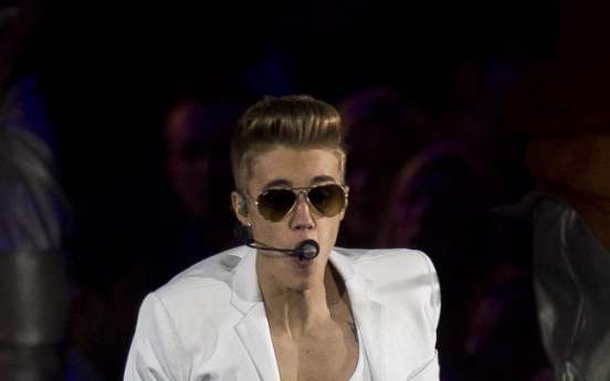 Bieber recovering after fainting at London concert