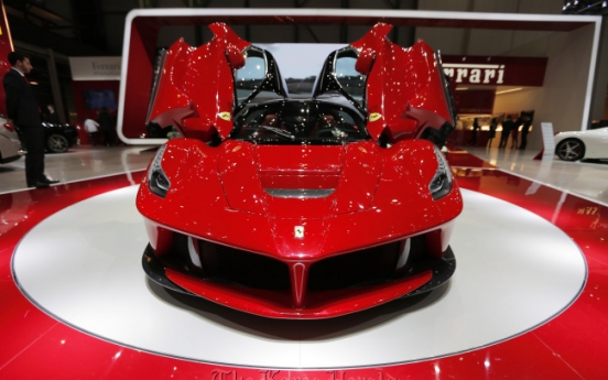 Ferrari hybrid hits resurgent market