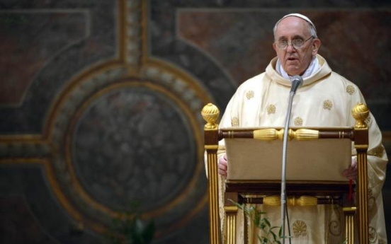 Pope warns church of dangers of inaction