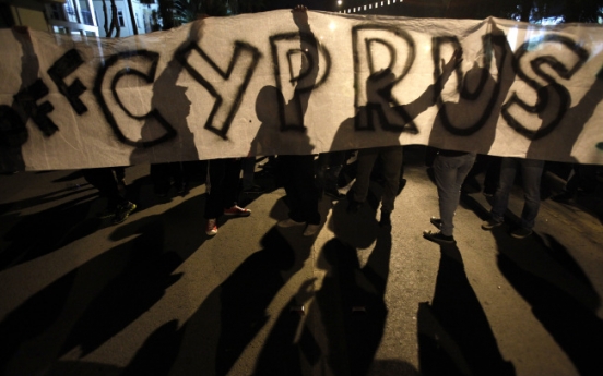 Euro, Asian shares rally on Cyprus deal relief