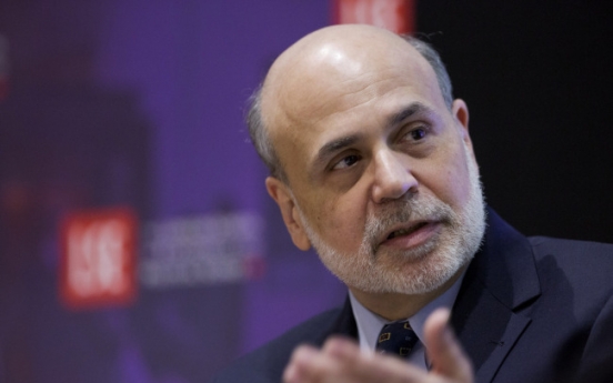 Fed’s low-interest-rate policies help world economy, Bernanke says