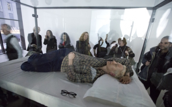 British actress Swinton takes an artful nap at Museum of Modern Art