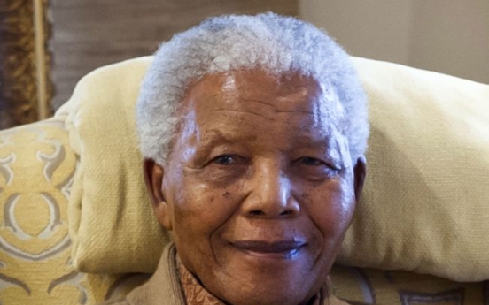 Mandela ‘responding positively’