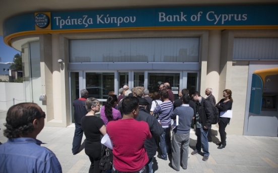 Cyprus capital controls could be lifted in a month