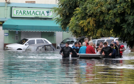 Flooding from torrential rains kills 52 in Argentina