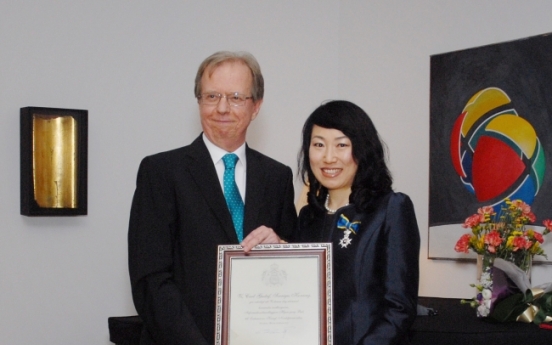 Local embassy staffer receives royal Swedish order