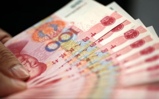 Fitch cuts China yuan debt rating on local government