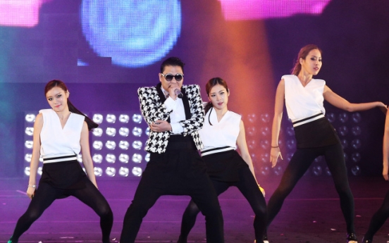 Psy sweeps stage with 'Gentleman'