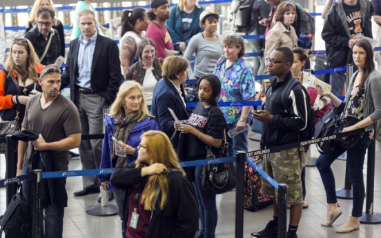 Flight delays pile up amid budget cuts