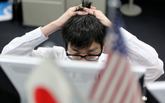 OECD backs Japan deflation fight