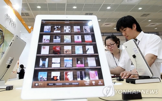 E-book market to expand 80% in 2013: analysts