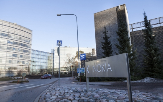 Nokia betting on $20 handset as it loses ground to iPhone