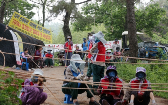 Controversial power-line works resume amid strong protests