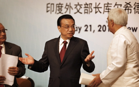 Chinese premier vows to open up markets to India