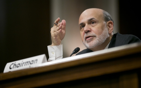 Bernanke signals Fed to stay course