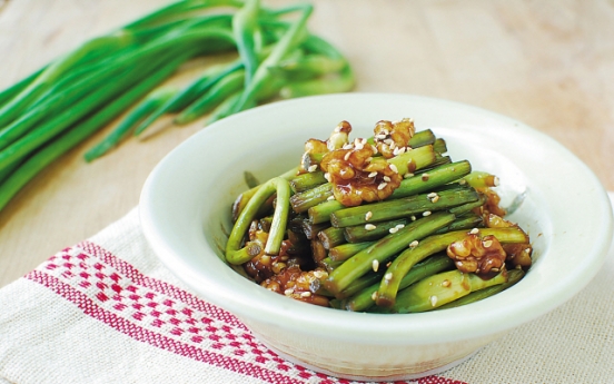 Maneuljjong hodu bokkeum (Stir-fried garlic scapes with walnuts)